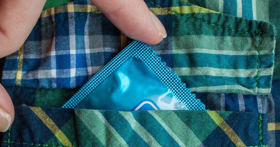 Taking the condom out of the pocket